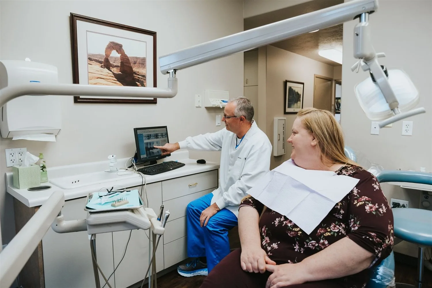 Dr. Blamires talks with a patient