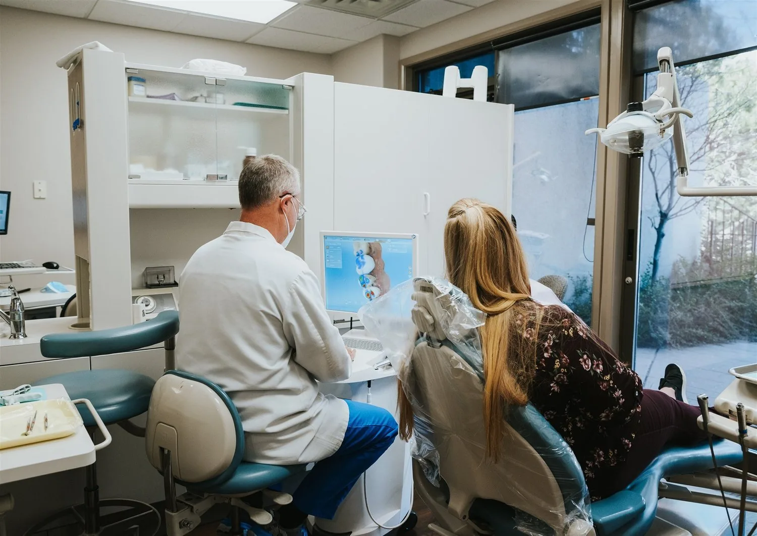 Dr. Blamires with a patient
